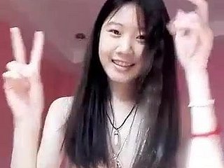 Cute Thai doll shows her sweet pink pussy